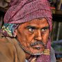 Varanasi, India. Shop keeper