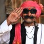 Agra, India. Doorman at restaurant