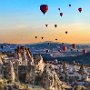                                Turkey - Capadoccia - Hot air balloons over fairy houses