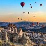                                Turkey - Capadoccia - Hot air balloons over fairy houses